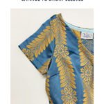 A close up image of one of our dress designs showing our sleeve options. The dress is blue and gold and has a V neckline.